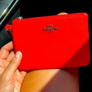 Coach wristlet orange authentic